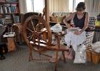 Diana carding some wool