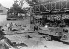 Flambo yard showing concrete blocks being made - block former by Dad