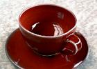Copper red cup and saucer 2006